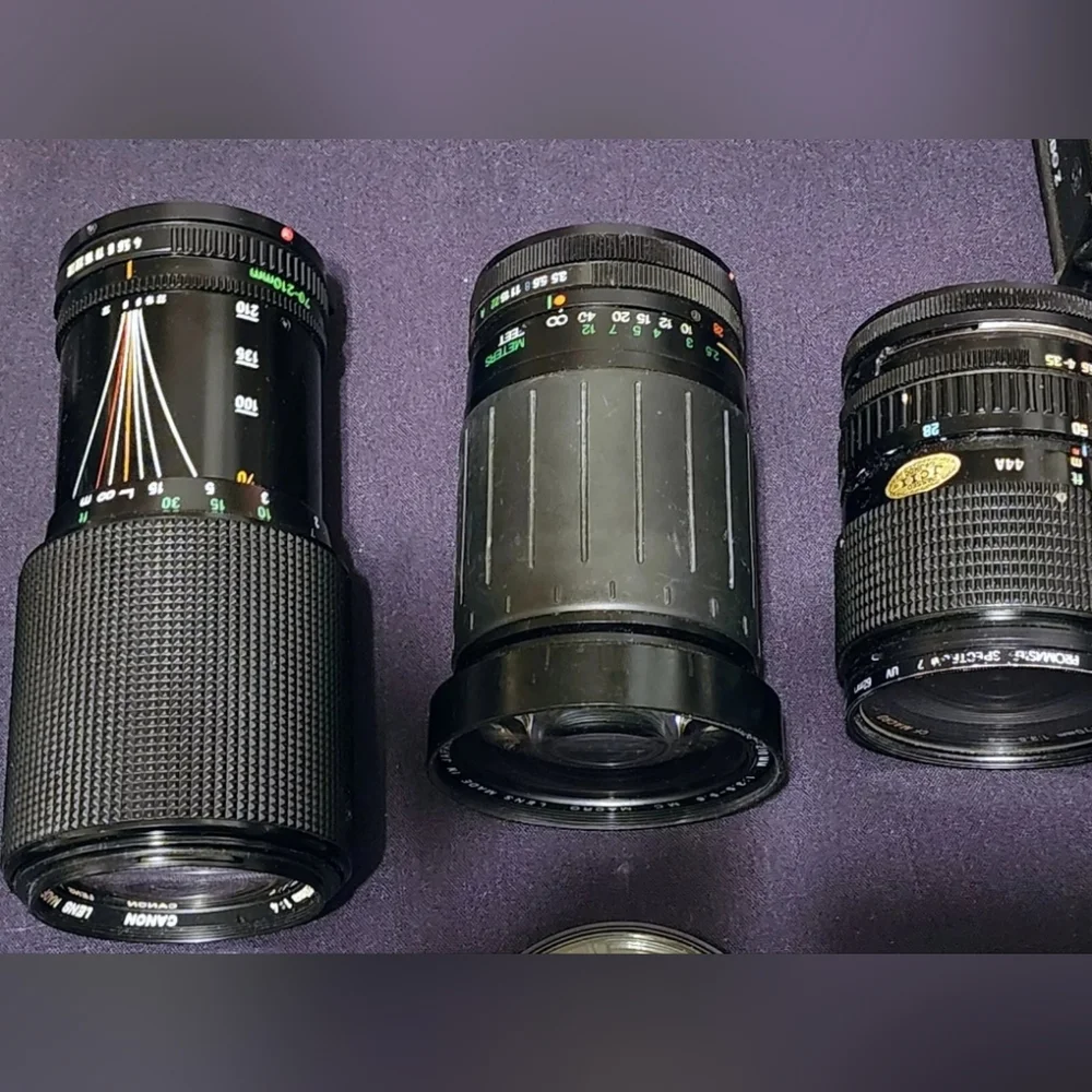 Two Canon cameras and lenses